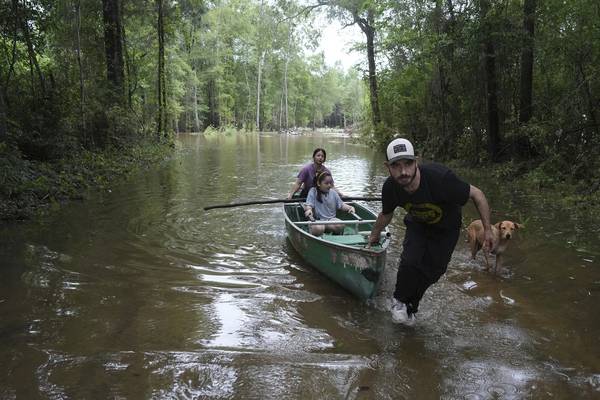 Heavy rains ease around Houston but flooding remains after hundreds of rescues and evacuations