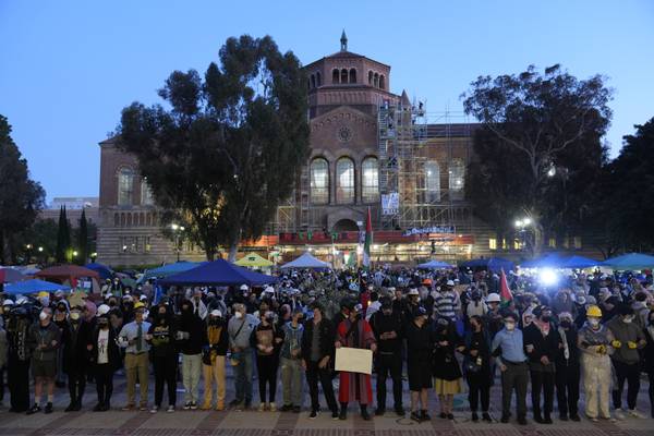 Hundreds of pro-Palestinian protesters remain on UCLA campus despite police ordering them to leave