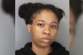 Woman accused of killing man for $60, then using money to buy chicken wing combo