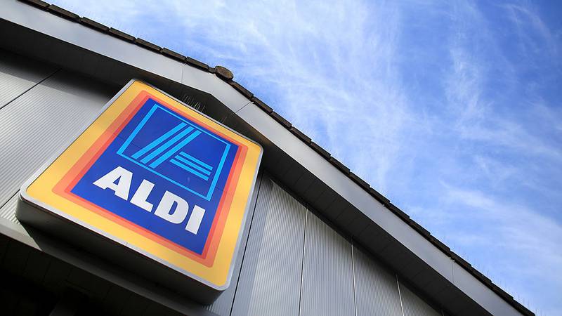 An Aldi sign on the outside of a store.