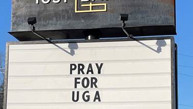 UGA murder: police probe, Congressman criticizes, city prays