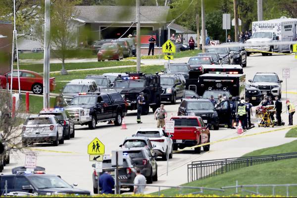 Police shot and killed armed student outside Wisconsin school, authorities say